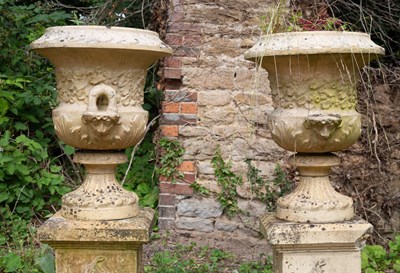 Lot 1342 - A pair of antique buff terracotta garden urns of classical form