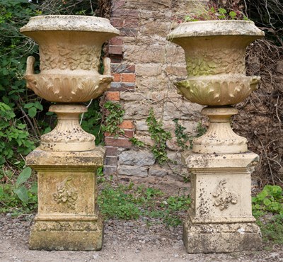 Lot 1342 - A pair of antique buff terracotta garden urns of classical form