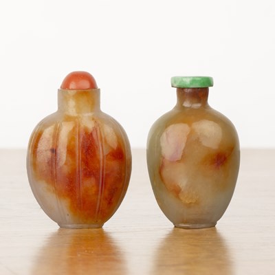 Lot 268 - Two nephrite snuff bottles Chinese, 1800-1850...