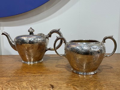 Lot 444 - Two piece Victorian silver tea set Consisting...