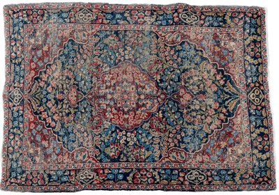 Lot 1041 - An antique blue ground Oriental rug