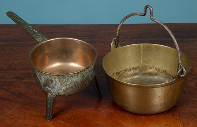 Lot 344 - A brass preserve pan and an early 19th century skillet