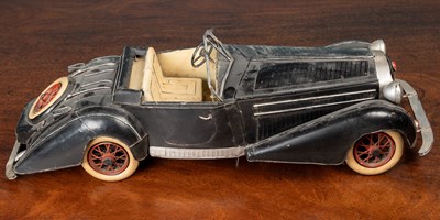 Lot 286 - A tinplate model of a vintage open topped car