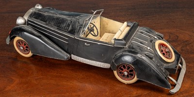 Lot 286 - A tinplate model of a vintage open topped car