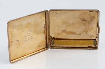 Lot 525 - A 9 carat gold cigarette case, with engine...