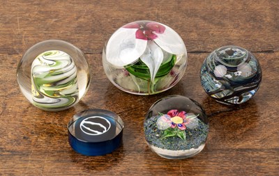 Lot 399 - Collection of five glass paperweights...