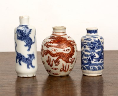 Lot 223 - Three porcelain snuff bottles Chinese, 19th...