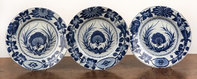 Lot 26 - Set of three blue and white large plates...