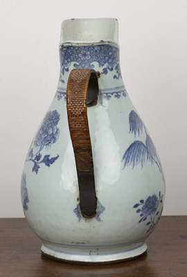Lot 14 - Large porcelain blue and white jug Chinese,...