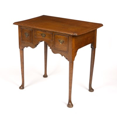 Lot 63 - A 19th century oak low boy with three drawers...