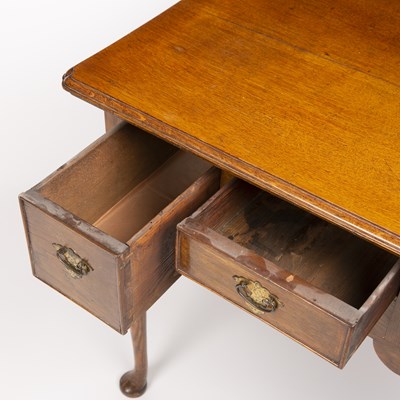 Lot 63 - A 19th century oak low boy with three drawers...