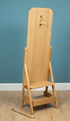 Lot 571 - A modern cheval mirror with an oak frame