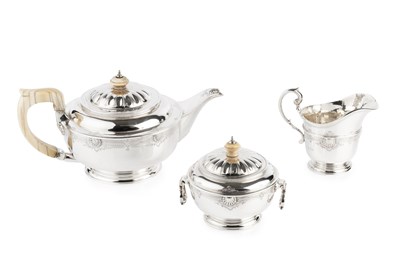 Lot 625 - A George V silver three piece tea service, of...