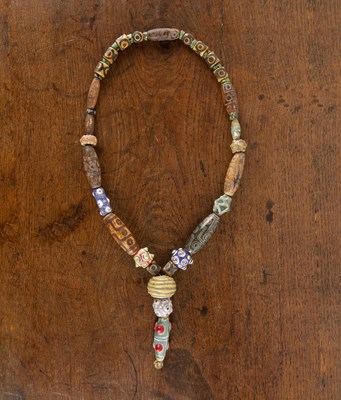 Lot 283 - Dzi bead necklace with two Roman spherical...