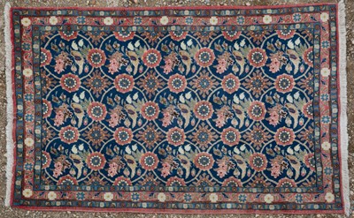 Lot 1069 - A blue ground Oriental rug