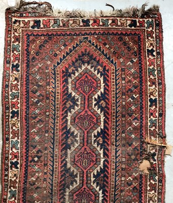 Lot 1074 - An old Oriental blue ground runner