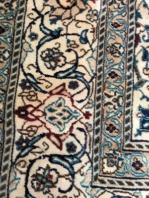 Lot 1078 - A red ground Oriental rug