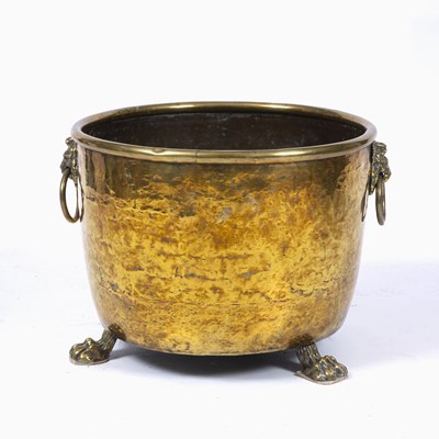 Lot 43 - A 19th century brass log bin with lion's mask...