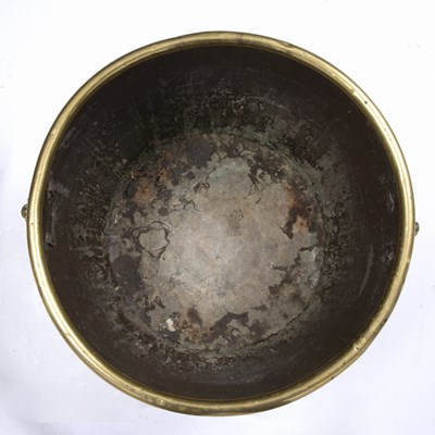 Lot 43 - A 19th century brass log bin with lion's mask...