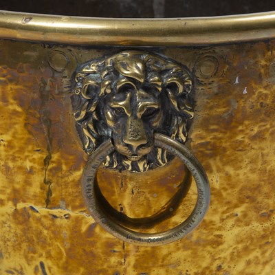 Lot 43 - A 19th century brass log bin with lion's mask...