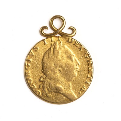 Lot 129 - A George III gold spade guinea with a necklace...