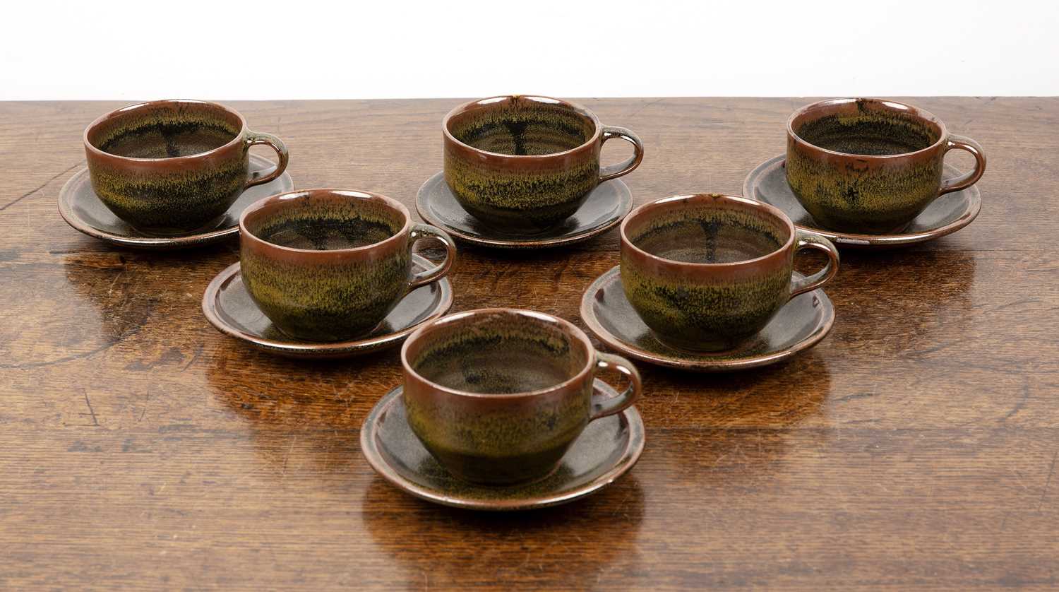 Lot 341 - Set of six teacups and saucers Studio pottery,...