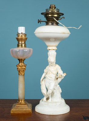 Lot 15 - Two oil lamps, converted for electricity