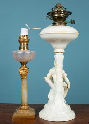 Lot 15 - Two oil lamps, converted for electricity