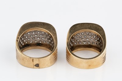 Lot 195 - Two diamond dress rings, of similar design,...