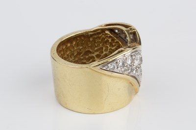 Lot 91 - A diamond set band ring, the slightly tapered...