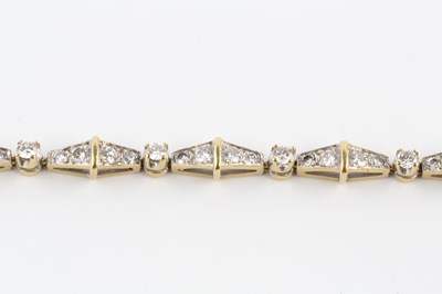 Lot 80 - A diamond panel bracelet, designed as a series...