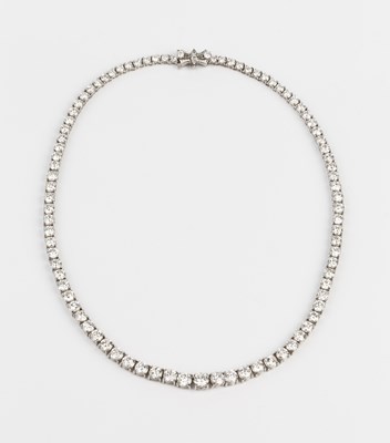 Lot 193 - A diamond rivière necklace, designed as a line...