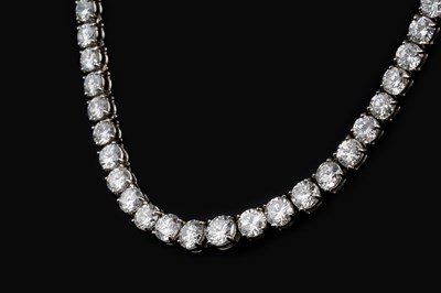 Lot 193 - A diamond rivière necklace, designed as a line...