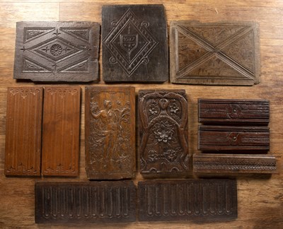 Lot 314 - Collection of carved hardwood panels to...