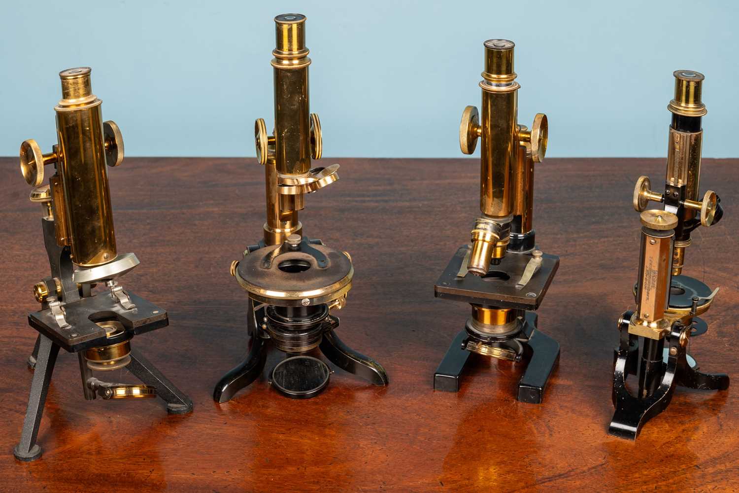 Two W Watson & Sons Brass monocular microscopes to include: a Fram 8911 and...