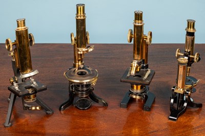 Lot 33 - Two W Watson & Son brass monocular microscopes