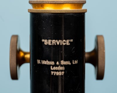 Lot 28 - A W Watson & Sons monocular microscope and an adjustable slide clamp by J Swift & Son London