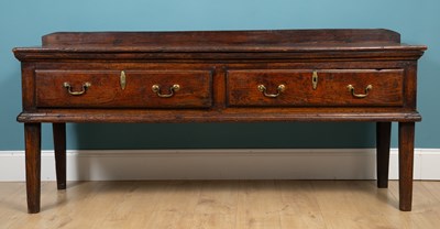 Lot 657 - An 18th century oak dresser base