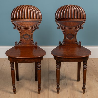 Lot 576 - A pair of Regency style hall chairs