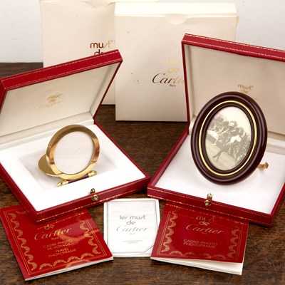 Lot 441 - Must de Cartier Two boxed photo frames, one a...