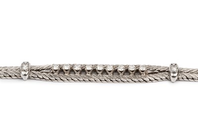 Lot 167 - A diamond set bracelet, of textured...