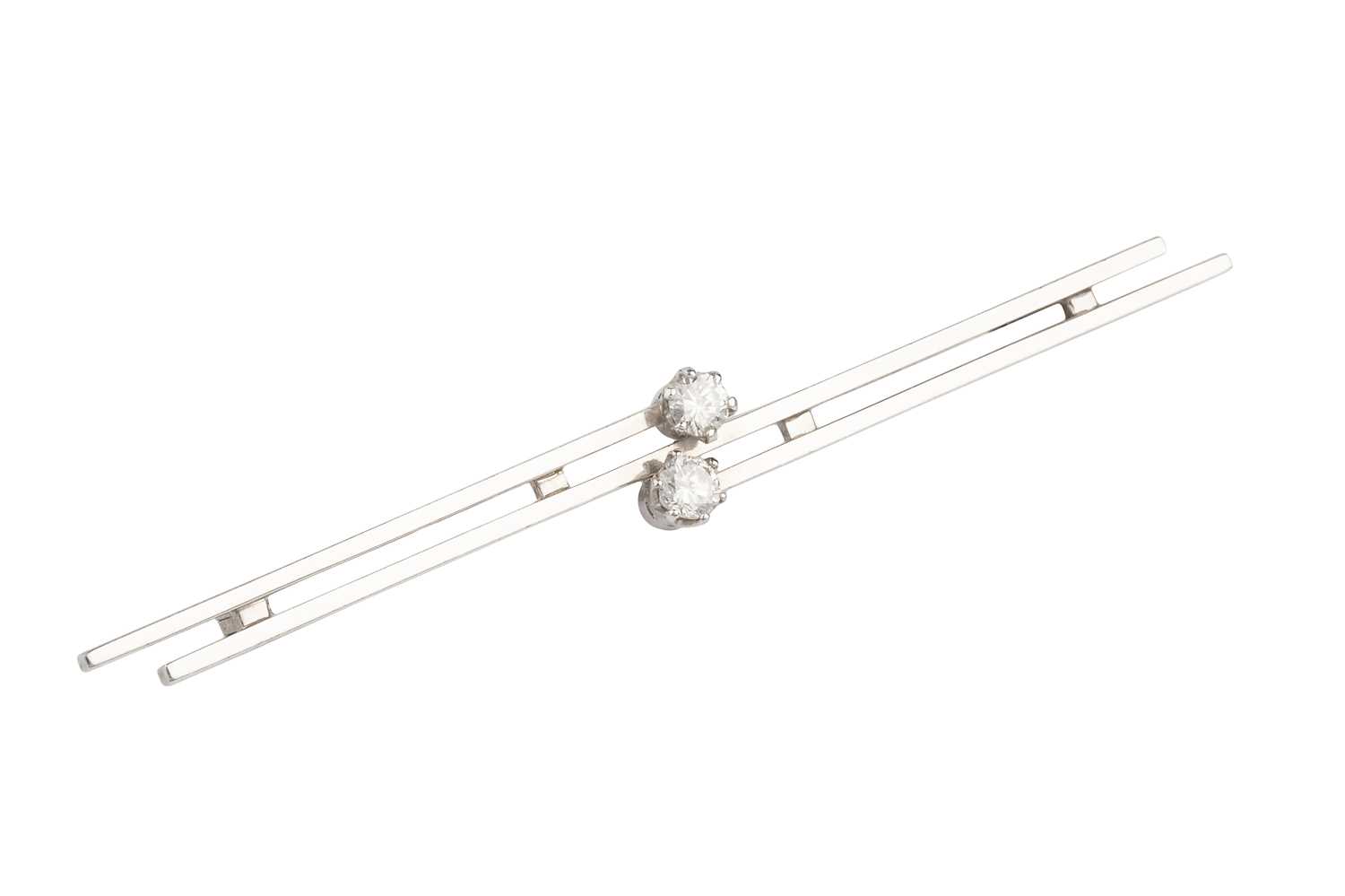 Lot 68 - A diamond two stone bar brooch, of crossover...