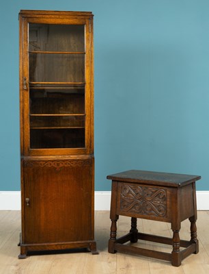 Lot 239 - An early 20th century oak bookcase; together with an oak coffer