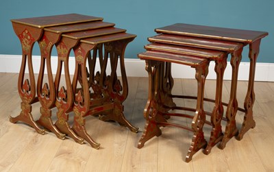 Lot 655 - Two red lacquered nests of four tables