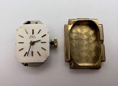 Lot 246 - A yellow precious metal bracelet watch, the...