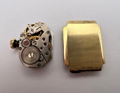 Lot 246 - A yellow precious metal bracelet watch, the...