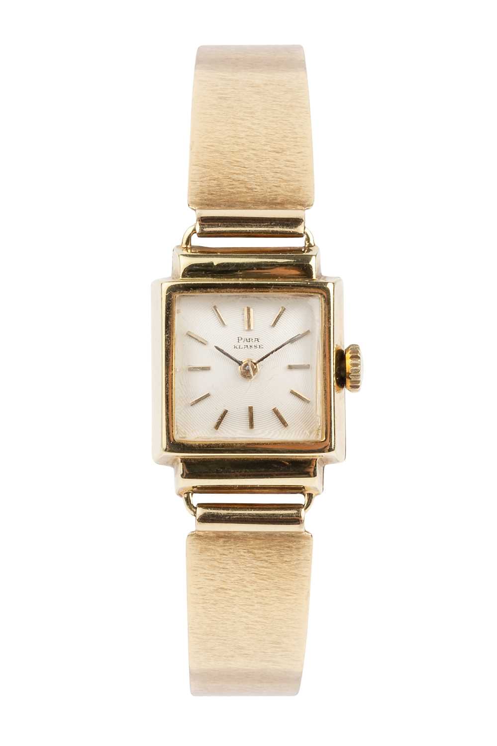 Lot 246 - A yellow precious metal bracelet watch, the...