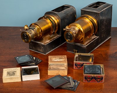 Lot 17 - Two JW London made magic lanterns together with slides