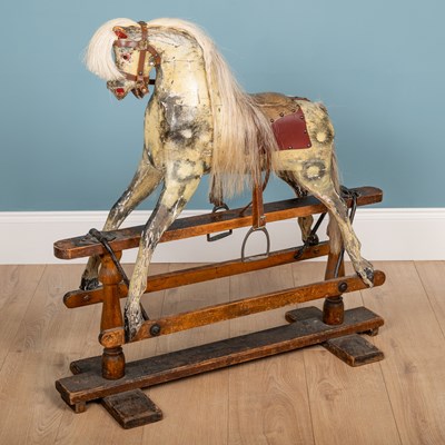 Lot 156 - A grey painted rocking horse