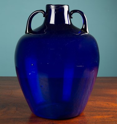 Lot 56 - A blue glass vase